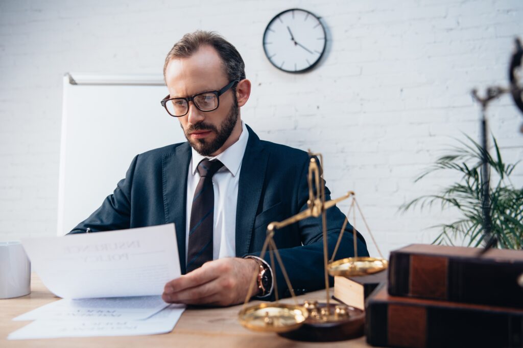 Selective focus of bearded lawyer looking at docum 2026 01 06 00 07 04 utc pichi